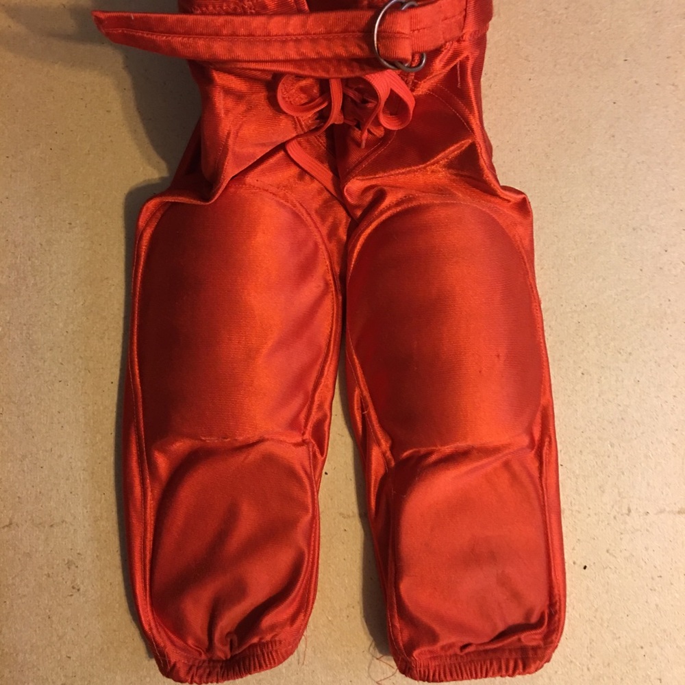 Small Orange Wilson Hard Padded Football Pants